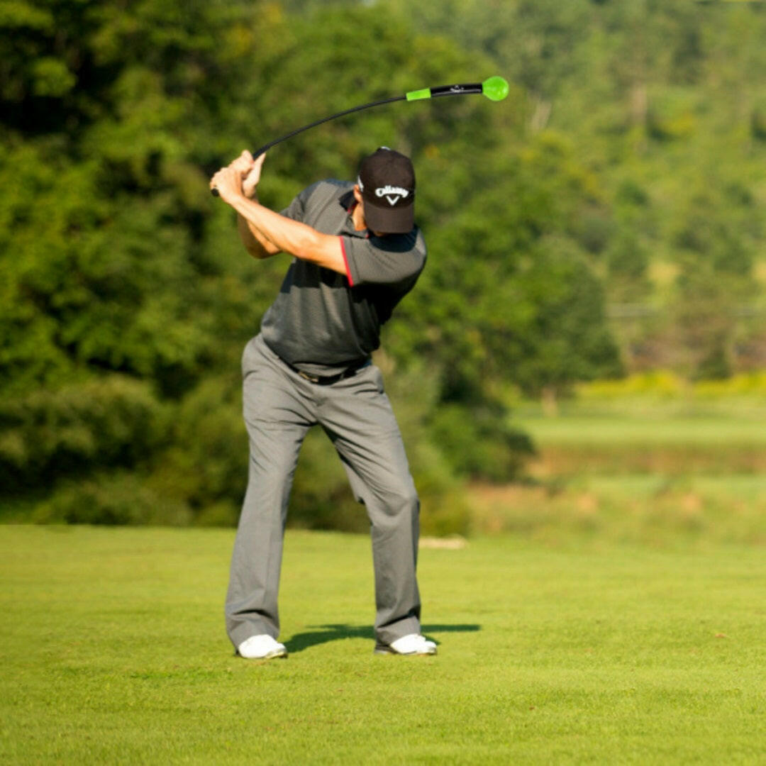 Callaway Swing Stick Tempo Training Aid - Person swinging the callaway swing stick