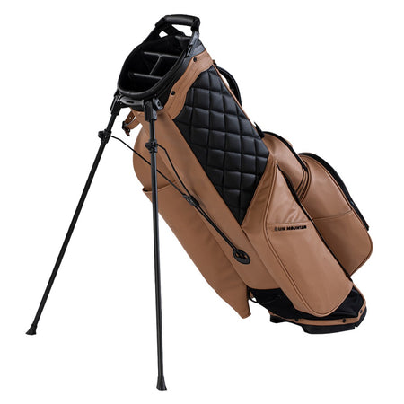 Sun Mountain Matchplay 4-Way Golf Stand Bag in Clay/Black, showing quilted hip pad and extended stand legs