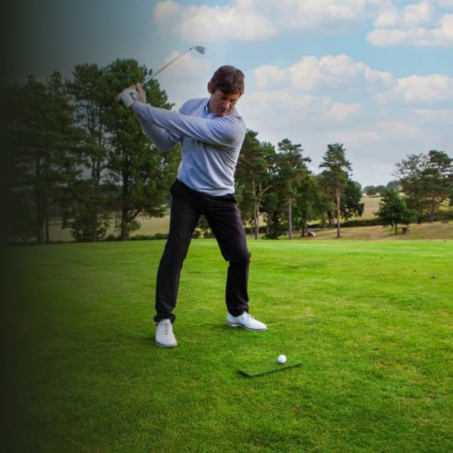 Golfer using Spurk Golf Mat Short Pile on golf course