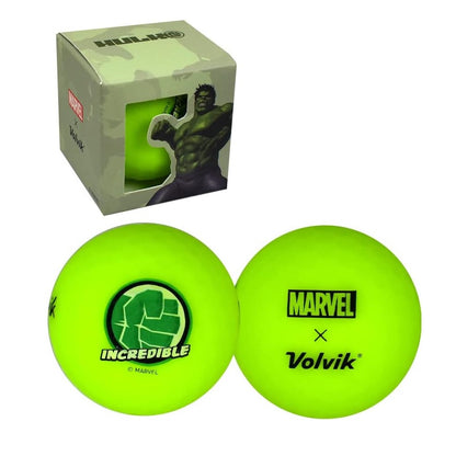 Two green golf balls with Marvel and Volvik branding next to a box featuring Hulk imagery.