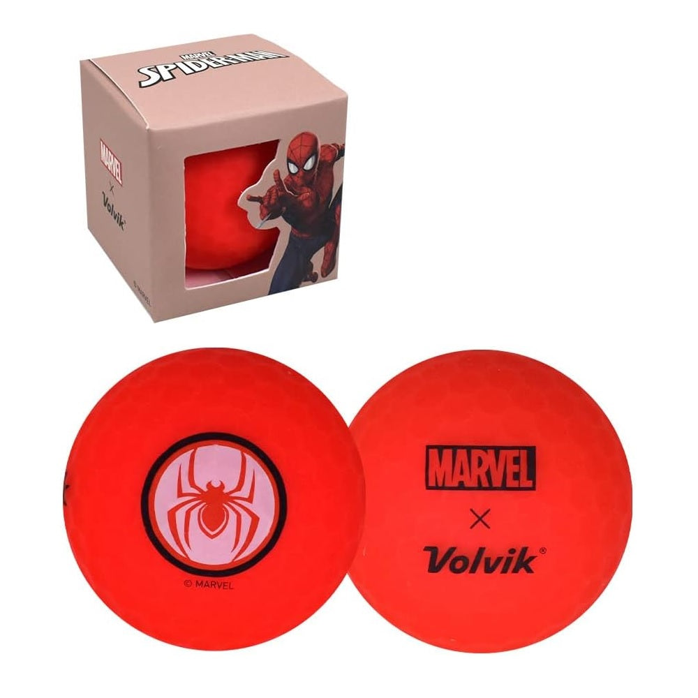 Two red golf balls with Marvel and Volvik logos next to a pink packaging box featuring Spider-Man.