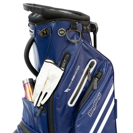 Close-up of the BagBoy Technowater Stand Bag in Navy showing zipped pockets and glove holder