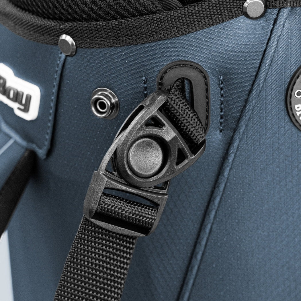 Close-up of the BagBoy Technowater Stand Bag shoulder strap buckle in Navy