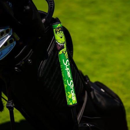 Green SuperStroke Marvel Hulk putter grip fitted to a putter beside a golf bag (bag not included)